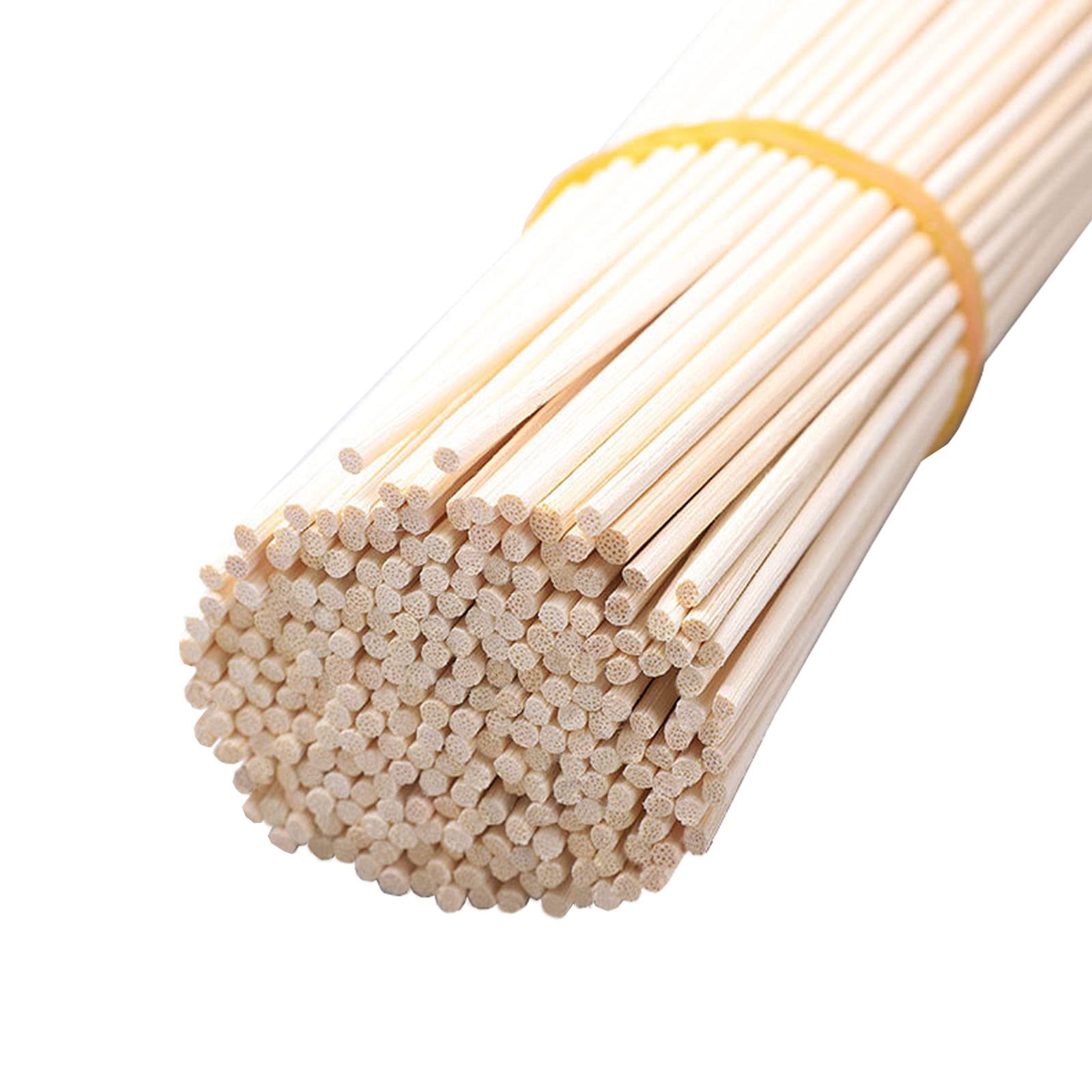Pale rattan reeds showing the ends and visible pores